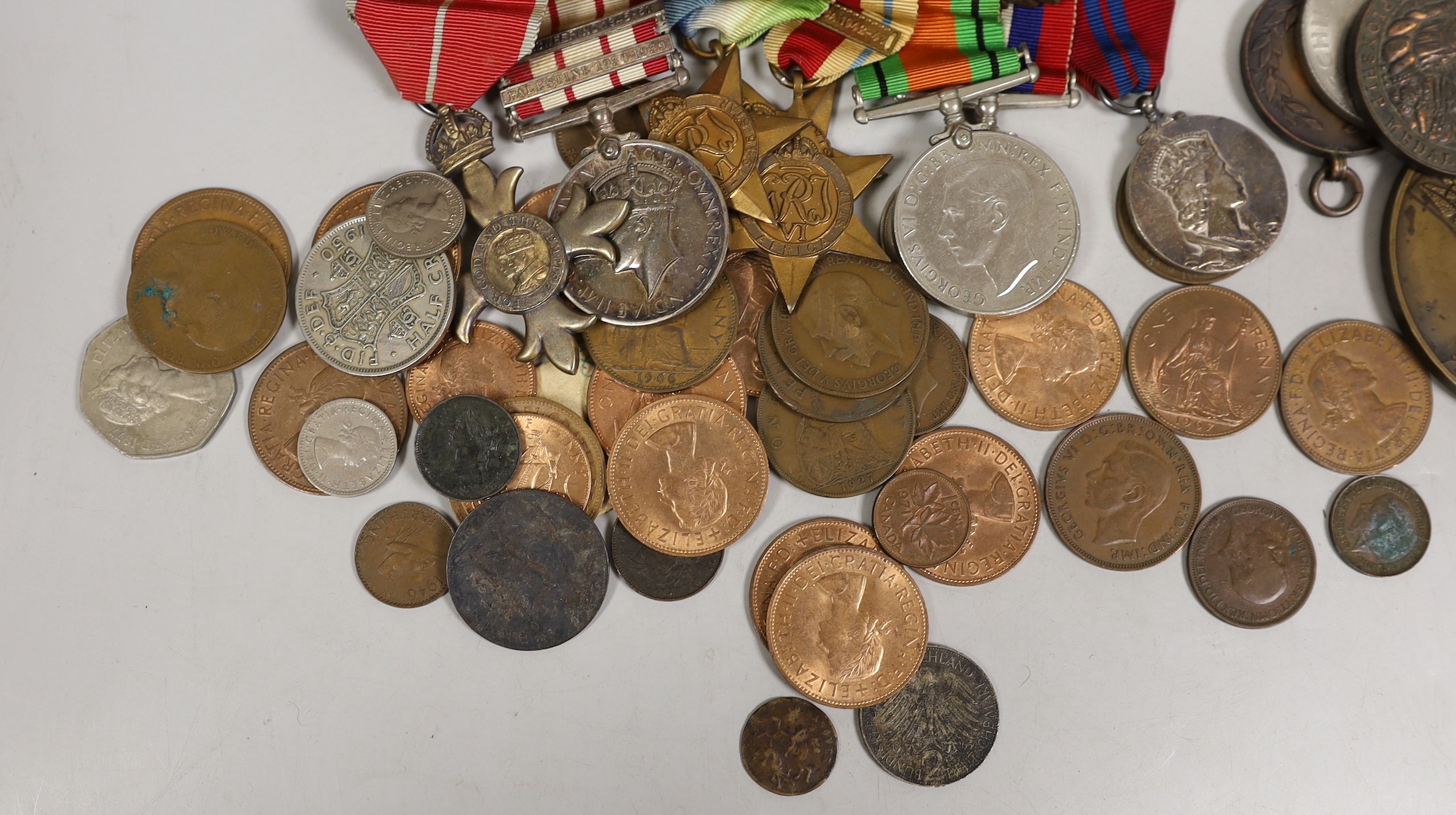 A WW2 to QEII M.B.E. group of eight medals to Lt. Cdr. F. S. Walford R.N., including naval general service medal with Minesweeping 1945-51 and Palestine 1956-1959 clasps , a cased Victoria Maundy coin set for 1880, an Ex